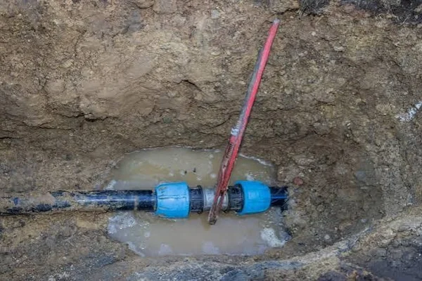 Underground water service line excavation and compression coupling repair in Sandy UT