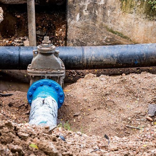 Heavy duty main sewer pipe replacement and municipal connection valve installation in Salt Lake City
